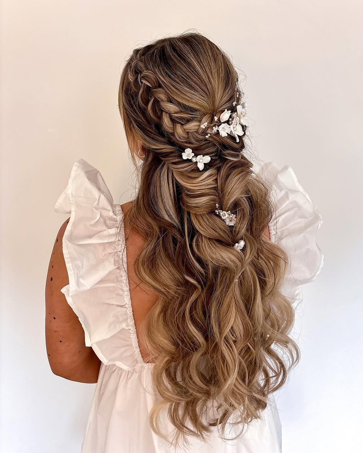 Bohemian Braids With Wavy Texture and Floral Accents