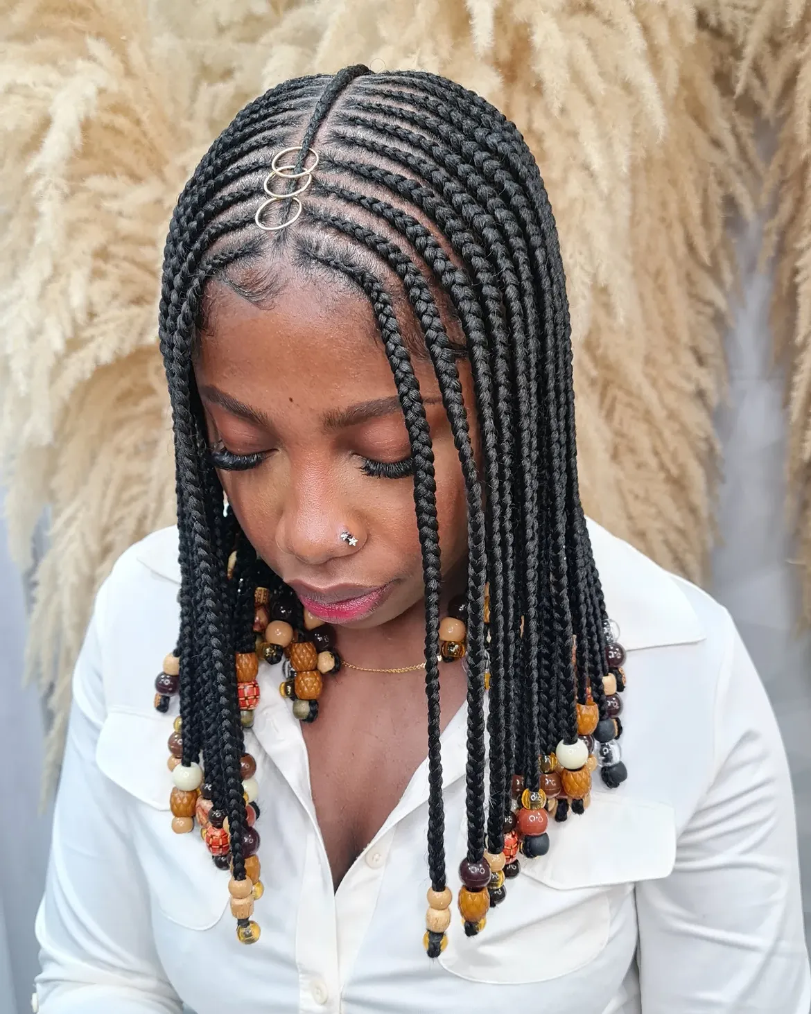 Box Braids with Wooden Beads and Gold Rings