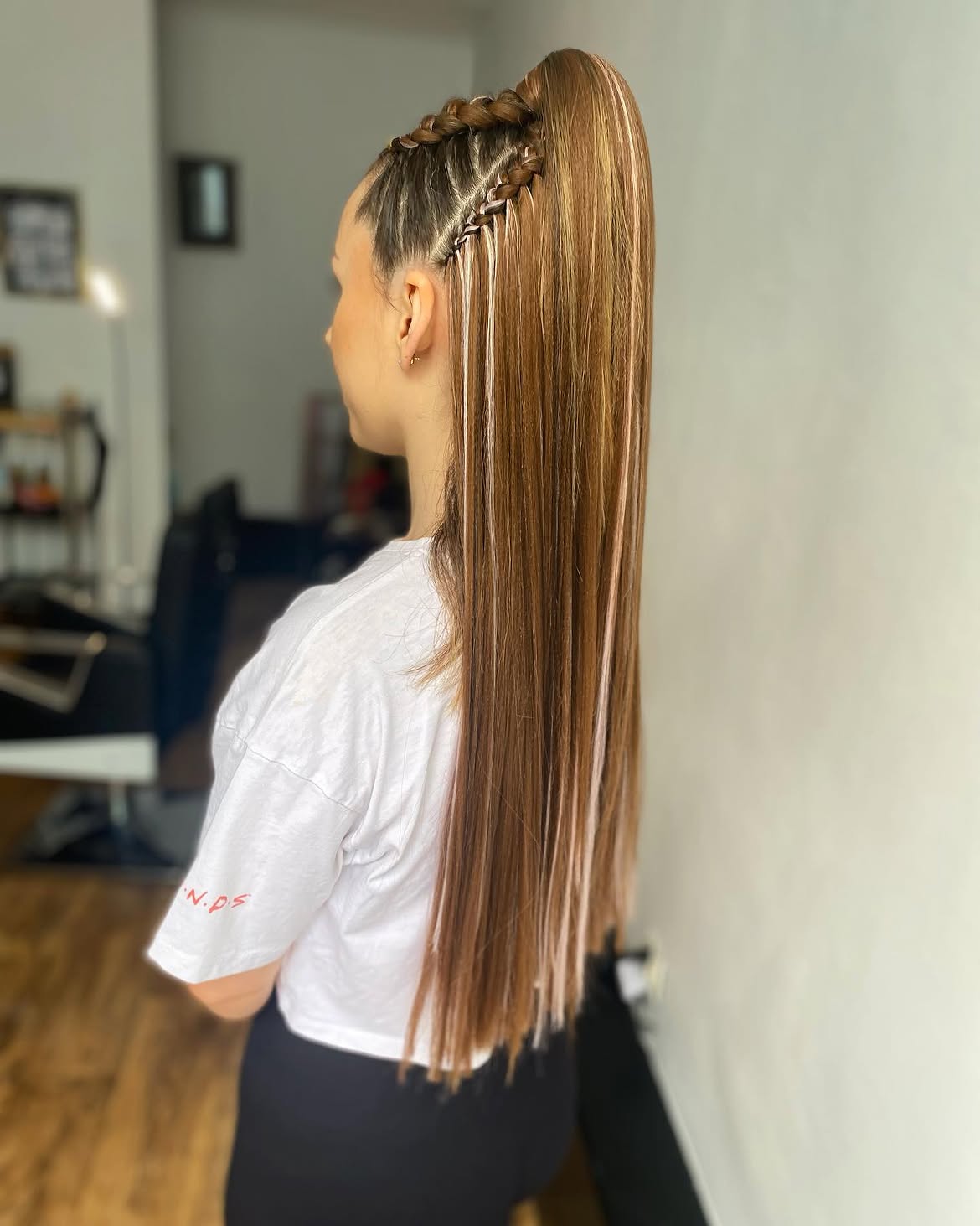 Braided High Ponytail With Accent Strands