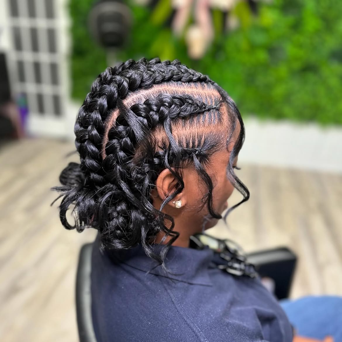 Braided Updo With Face Framing Tendrils