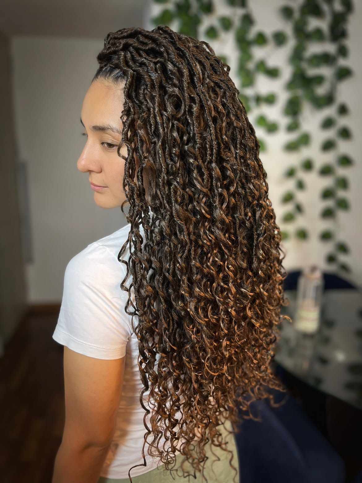 Cascading Curly Faux Locs With Warm Brown Highlights