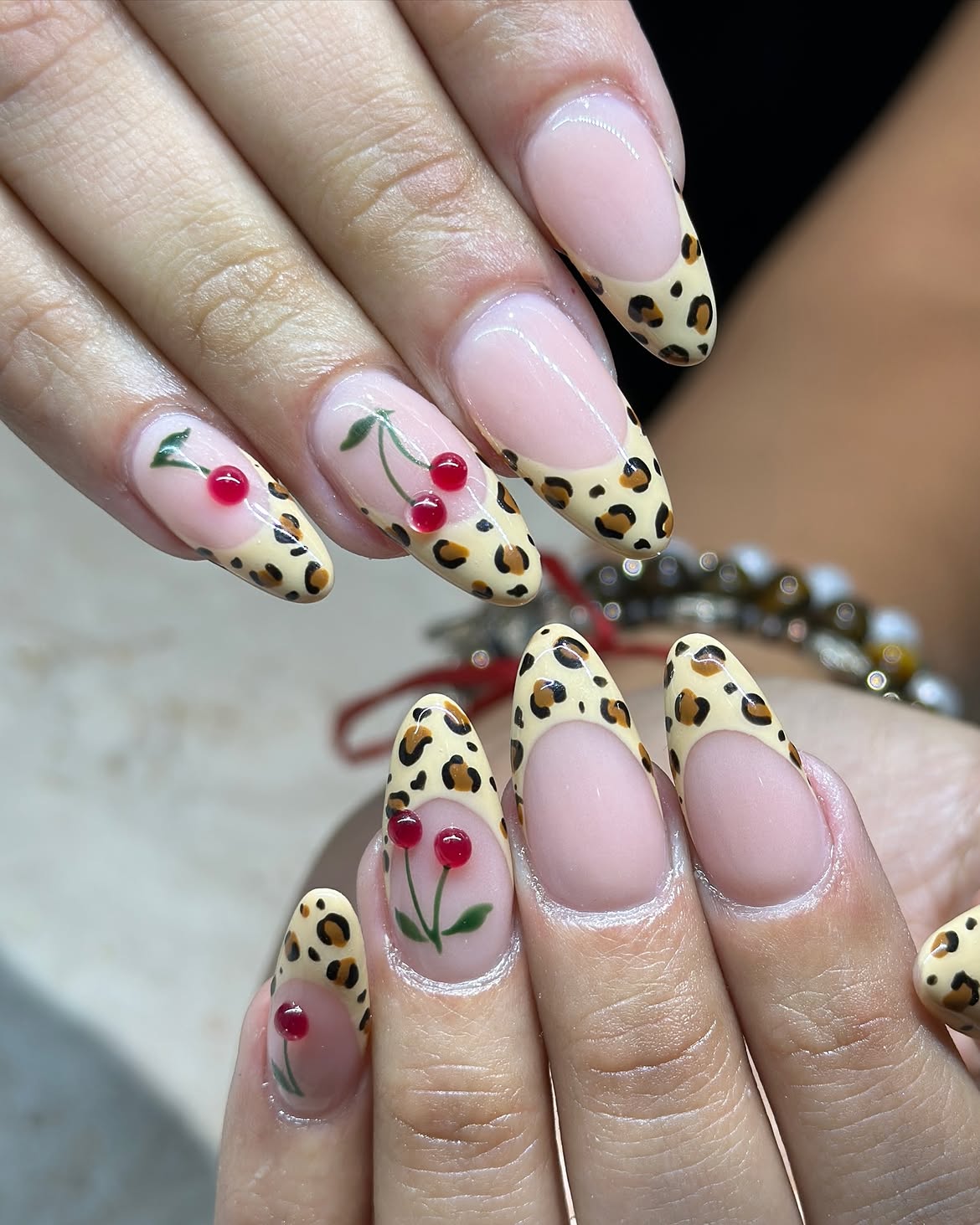 Cheetah French Tips with Cherry Accents