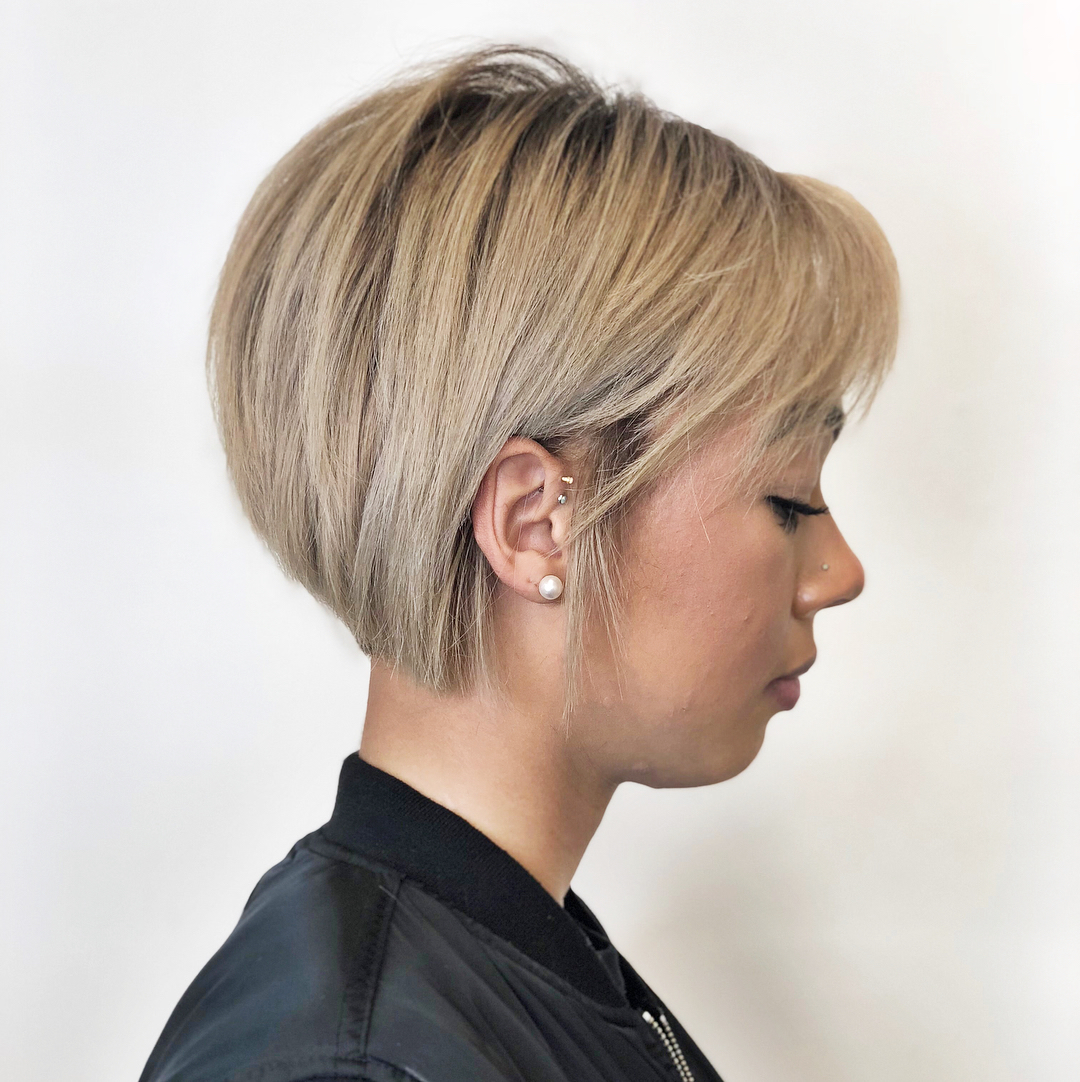 Chic Blonde Pixie Bob With Subtle Face Framing
