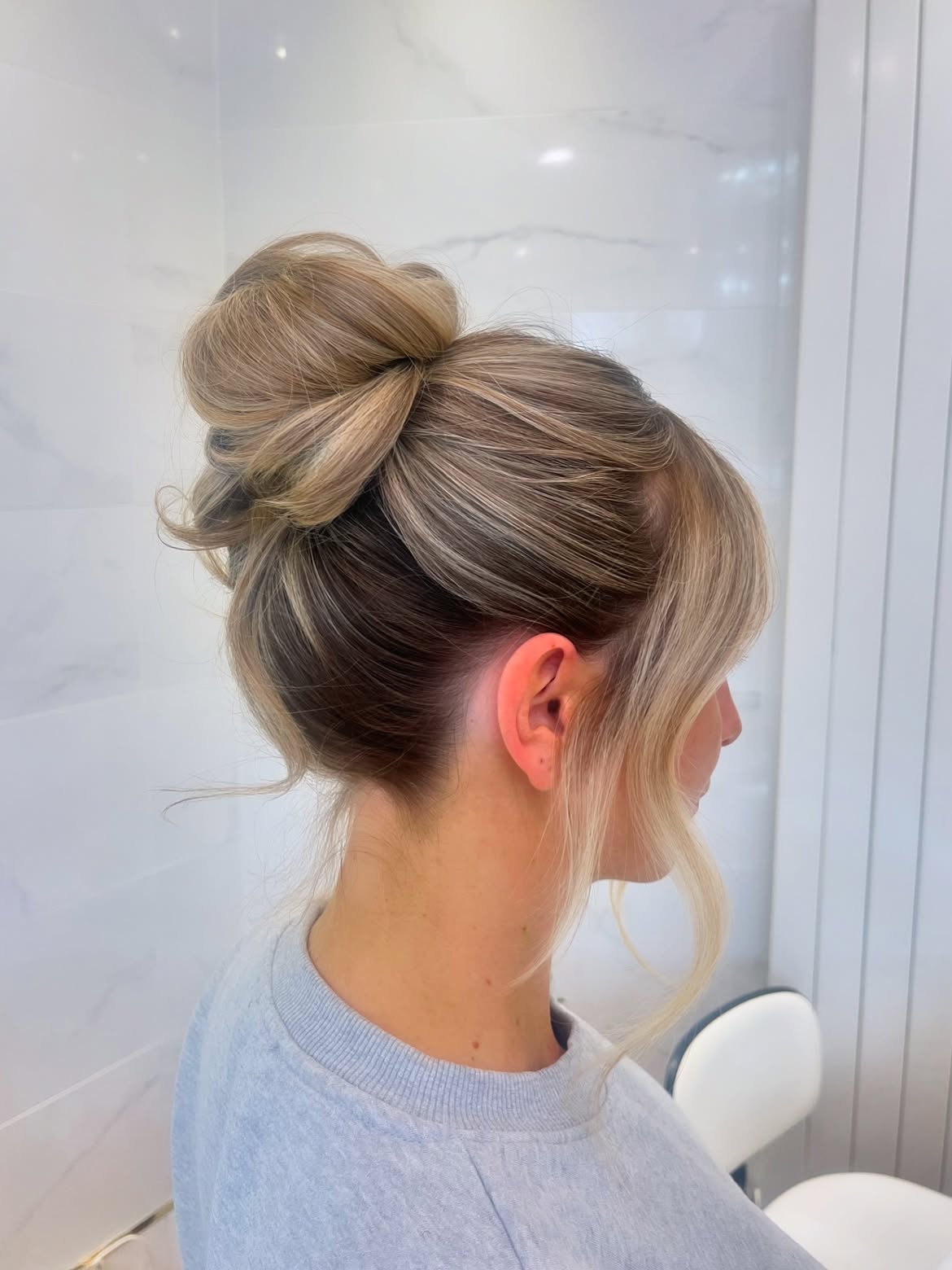 Chic Messy Top Knot With Face Framing Pieces