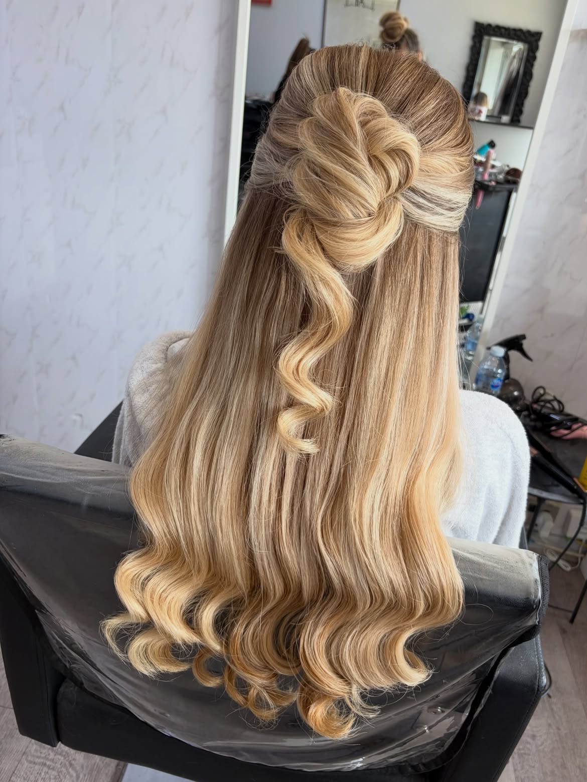 Chic Twisted Half-Up Style With Loose Waves
