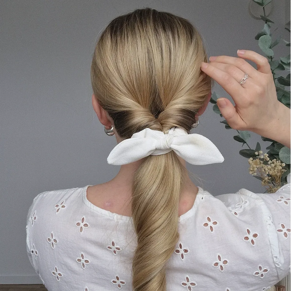 Chic Twisted Ponytail With White Scrunchie Bow