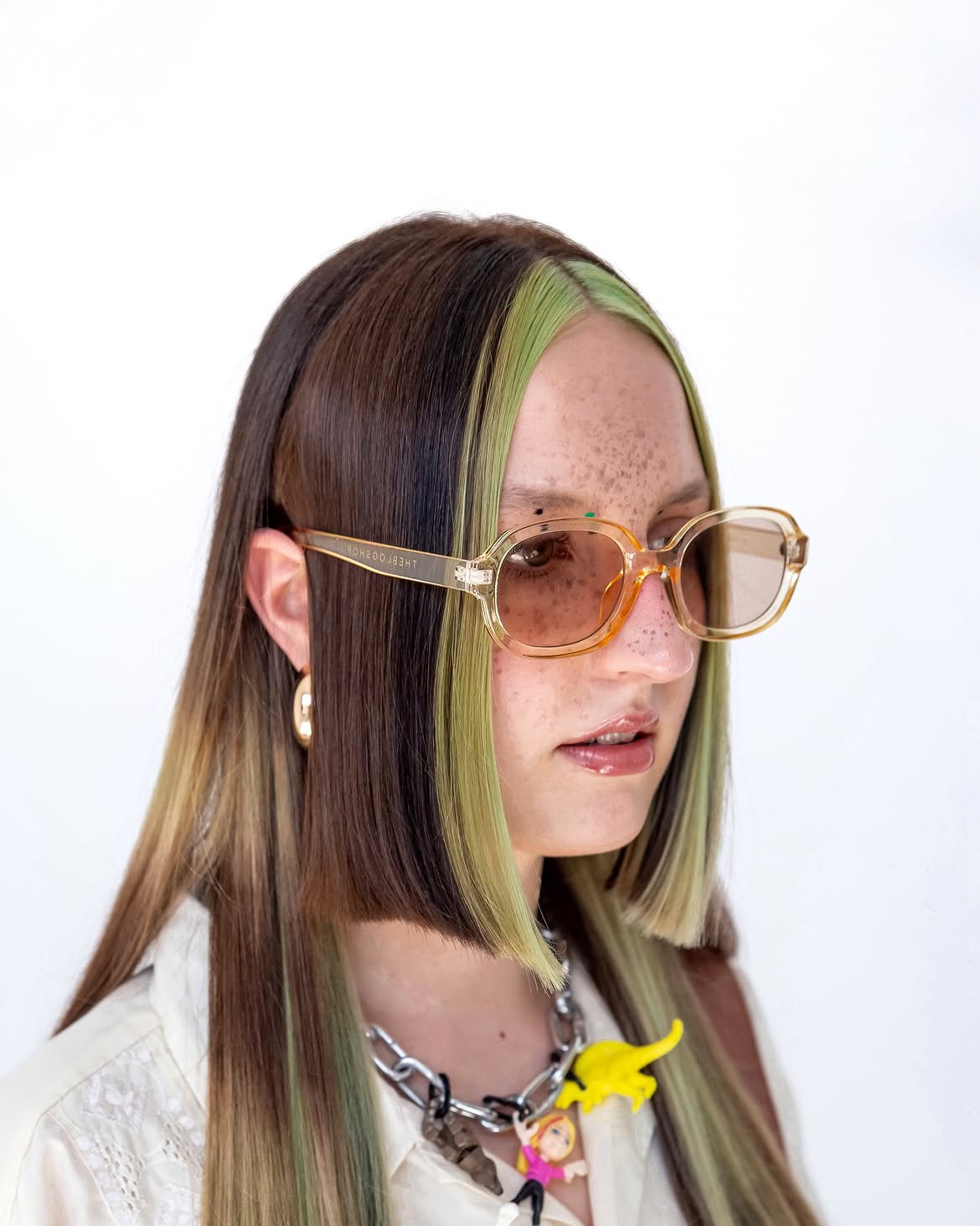 Chunky Green Streaks On A Blunt Bob