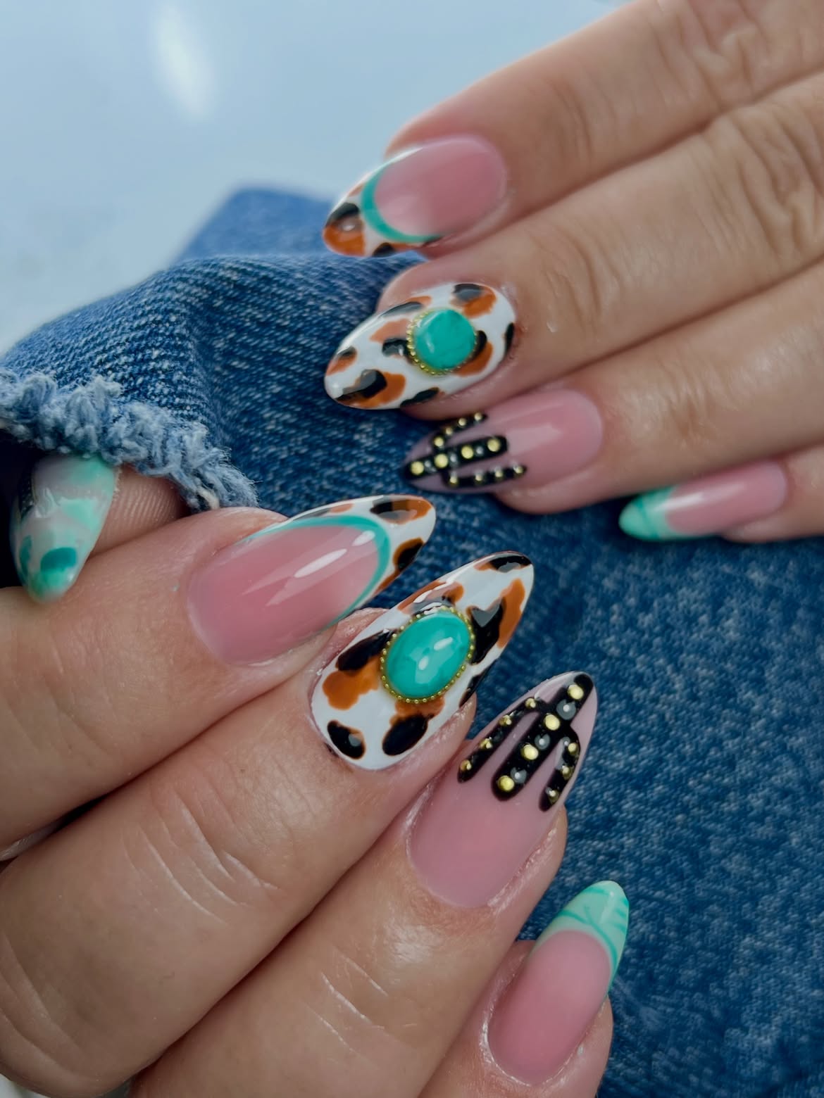 Cow print French tips with turquoise gems