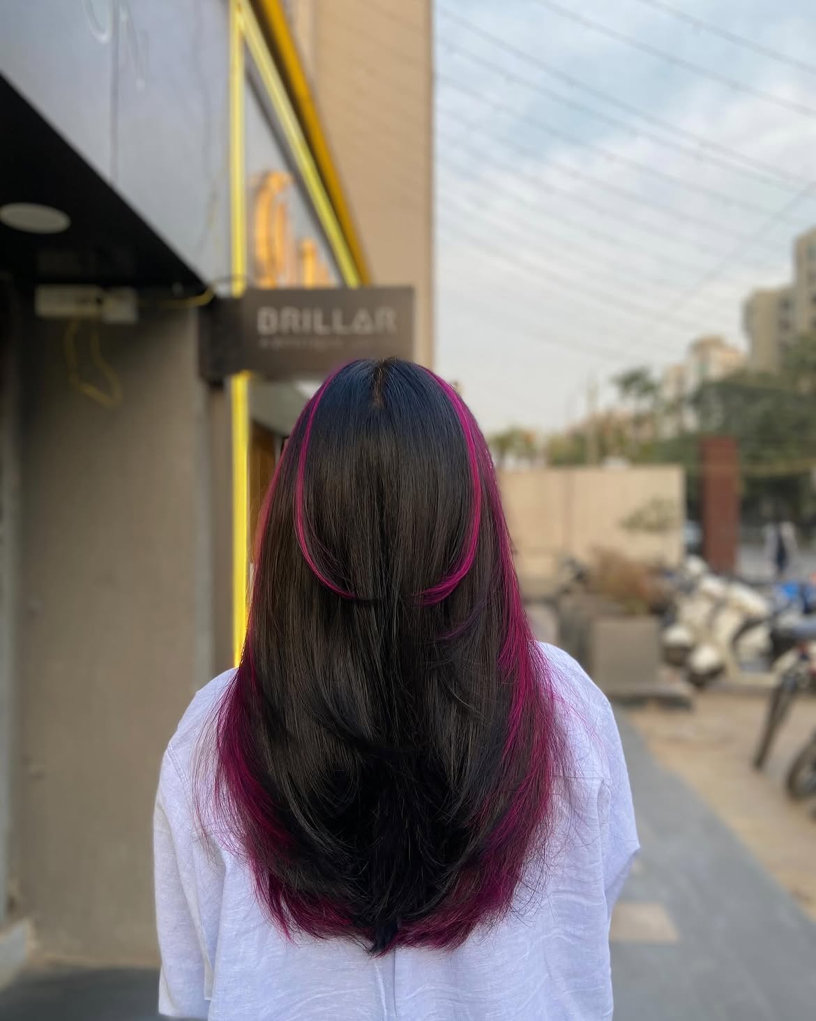 Dark Hair With Vibrant Magenta Peekaboo Highlights