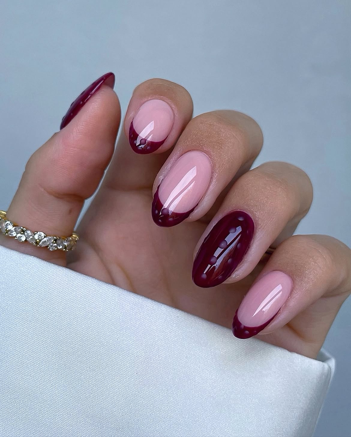 Deep Burgundy French Tip Oval Nails