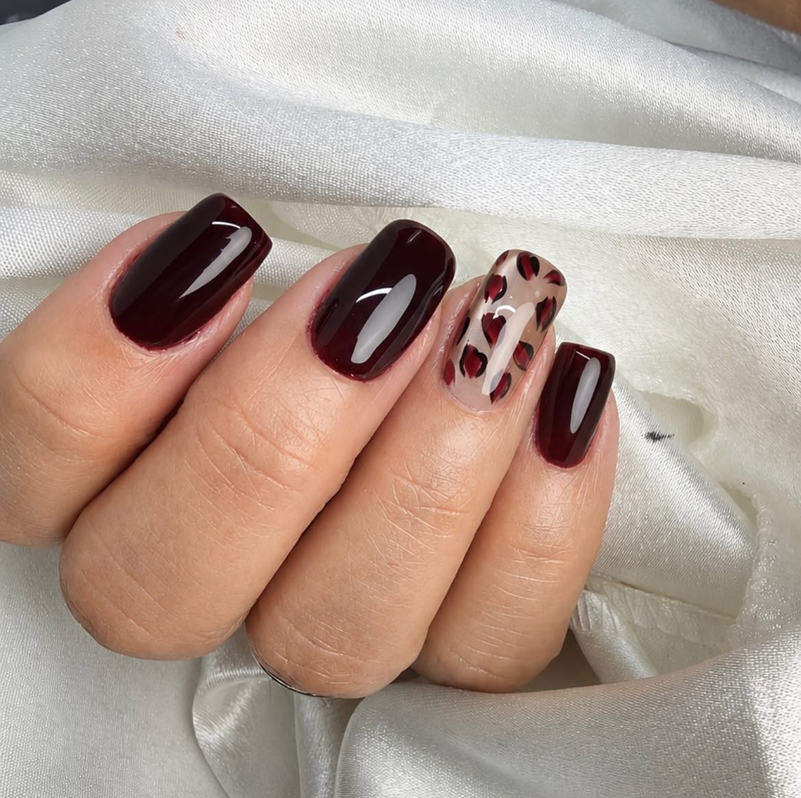Deep Burgundy Glossy Square Nails with Heart Accents