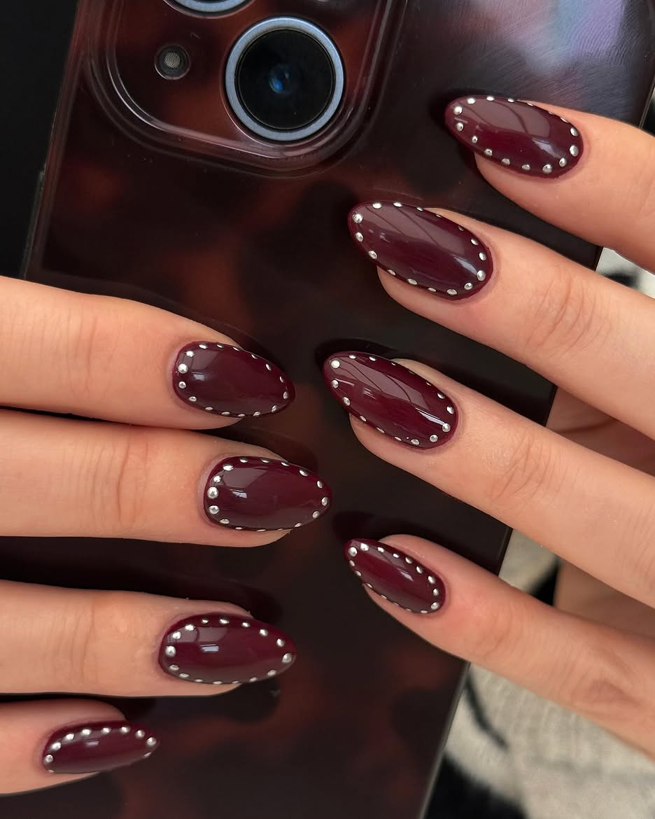 Deep Wine Oval Nails With Silver Stud Embellishments