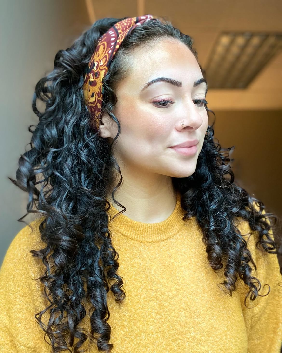 Defined Curly Layers With Printed Headband Accent