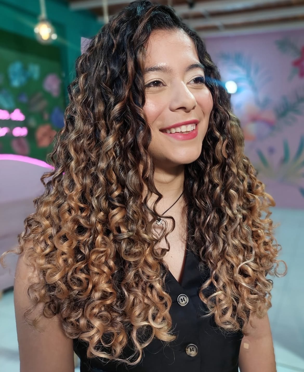 Dimensional Golden Brown Curls With Sun-Kissed Highlights