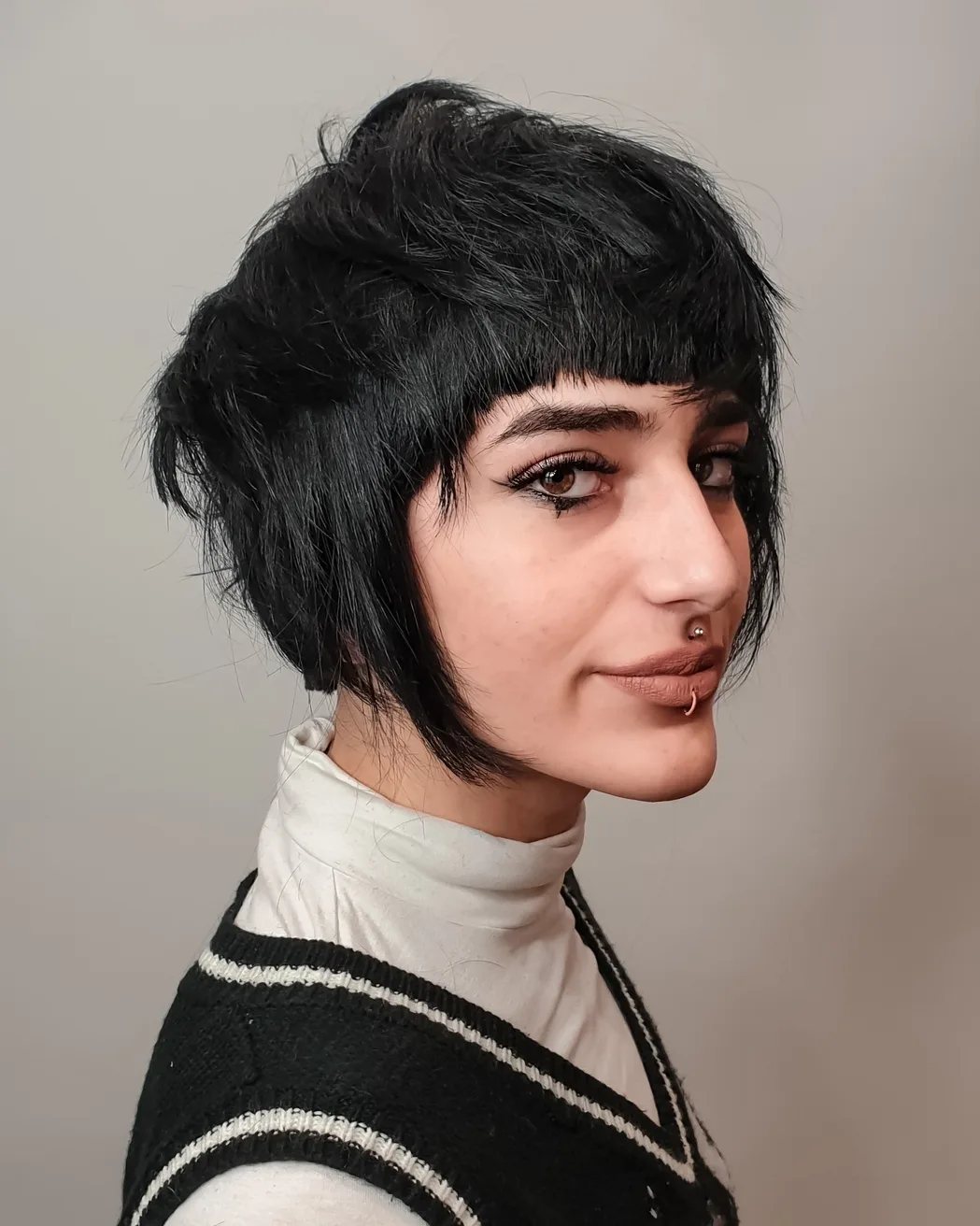 Edgy Layered Pixie Bob With Wispy Bangs