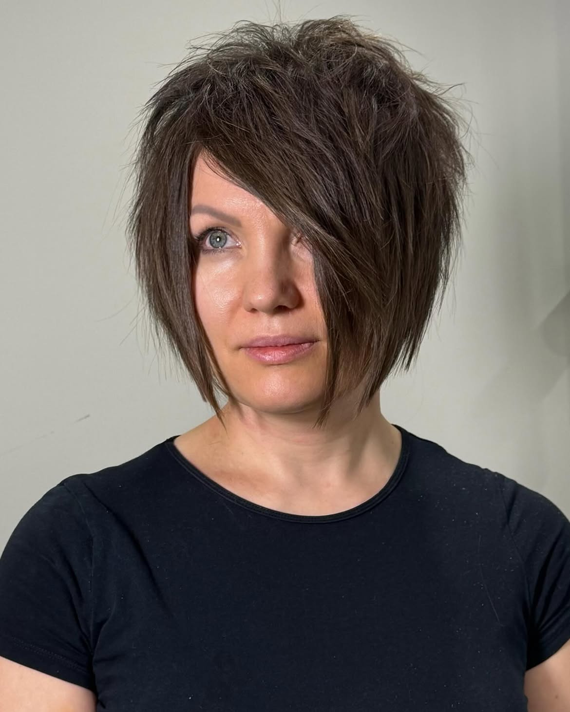 Edgy Textured Brunette Bob With Asymmetrical Bangs