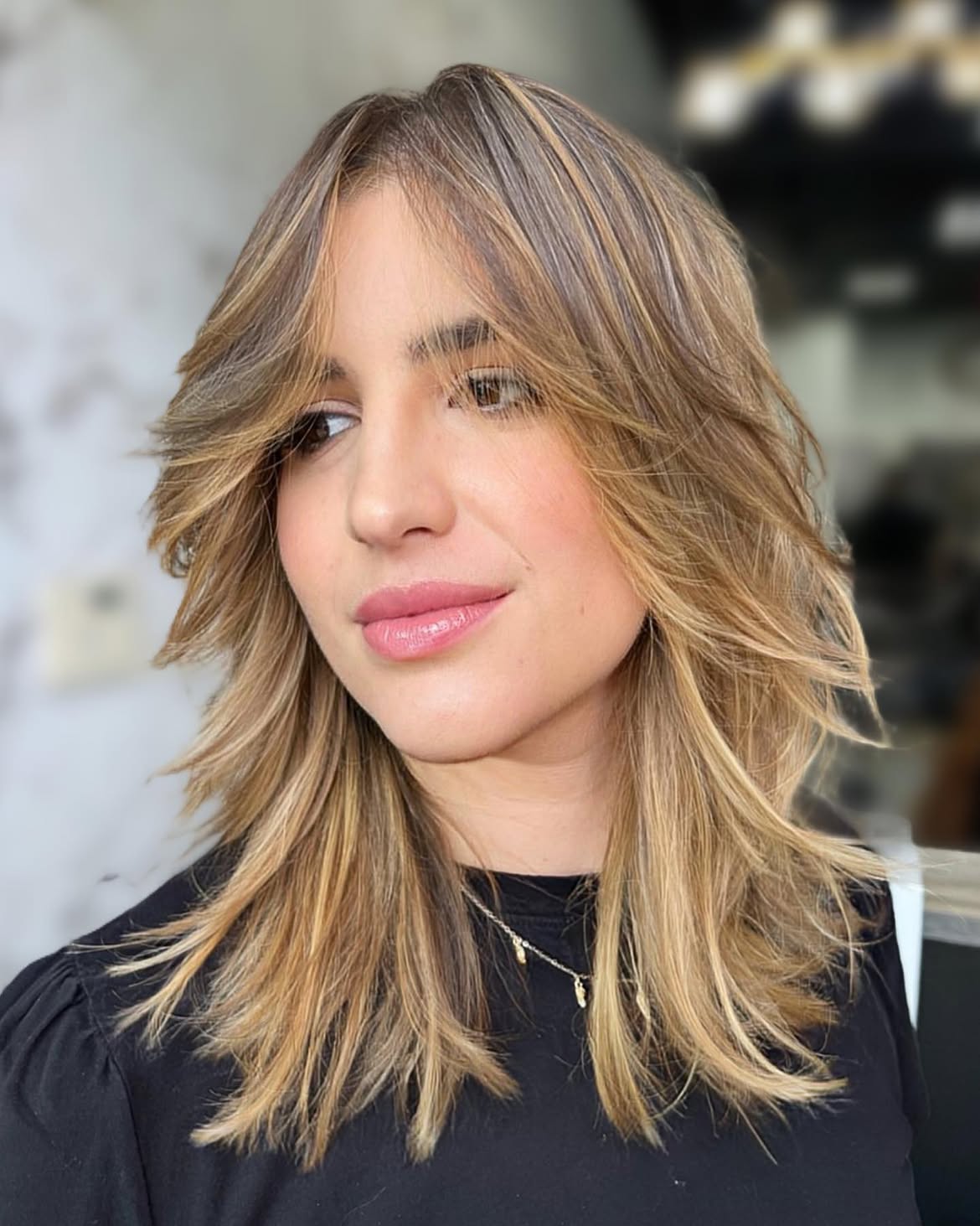 Effortless Face-Framing Layers With Honey Blonde Balayage