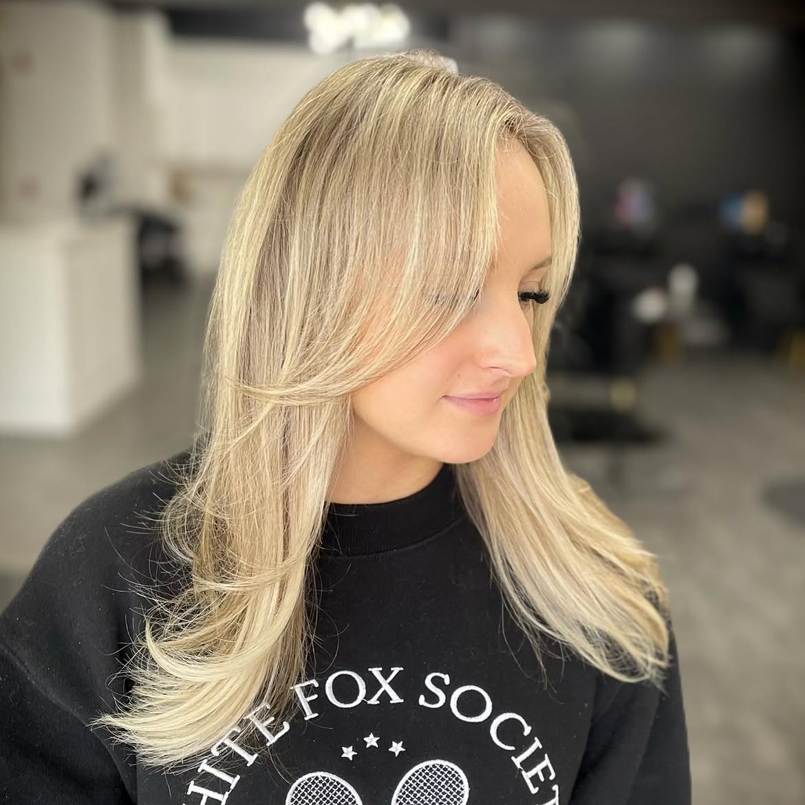 Effortless Honey Blonde Layers With Face-Framing Bangs