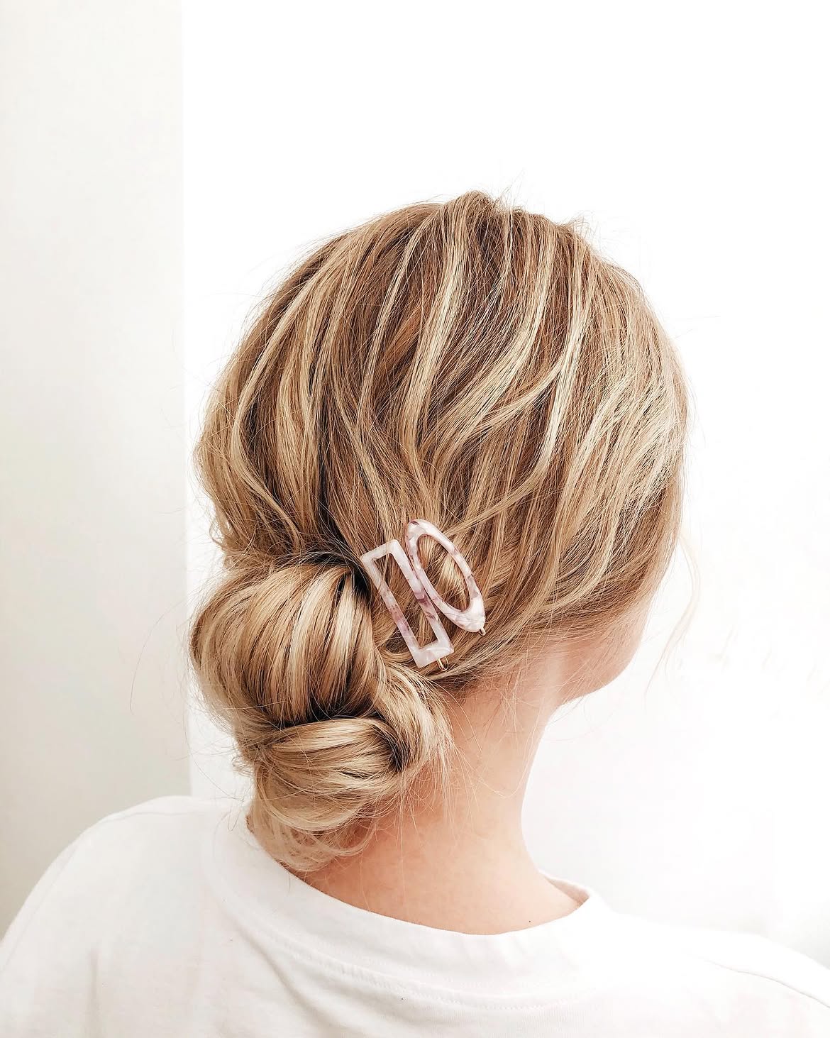 Effortless Low Bun With Chic Marble Hair Clips
