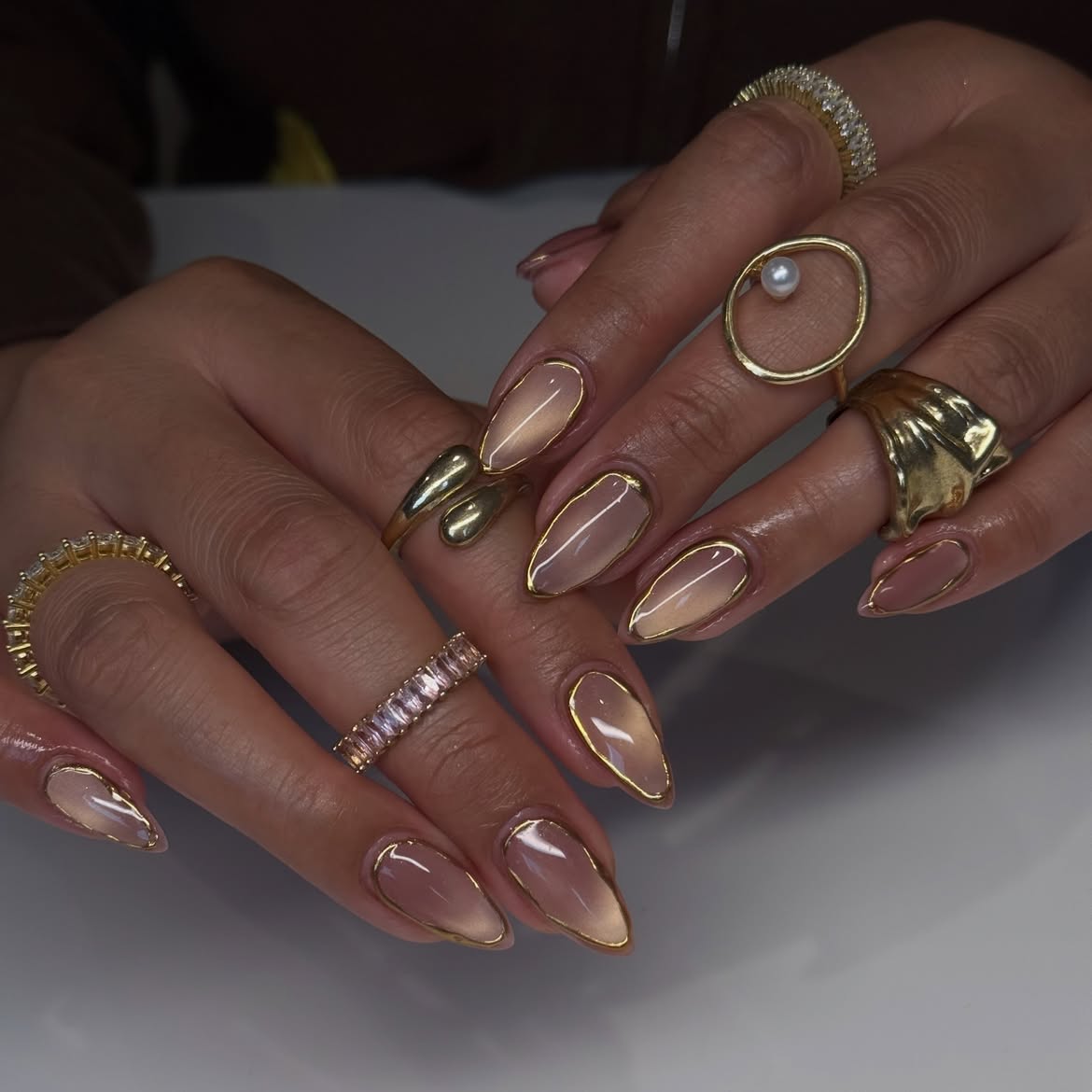 Elegant Golden Cat Eye Ombre Almond Nails