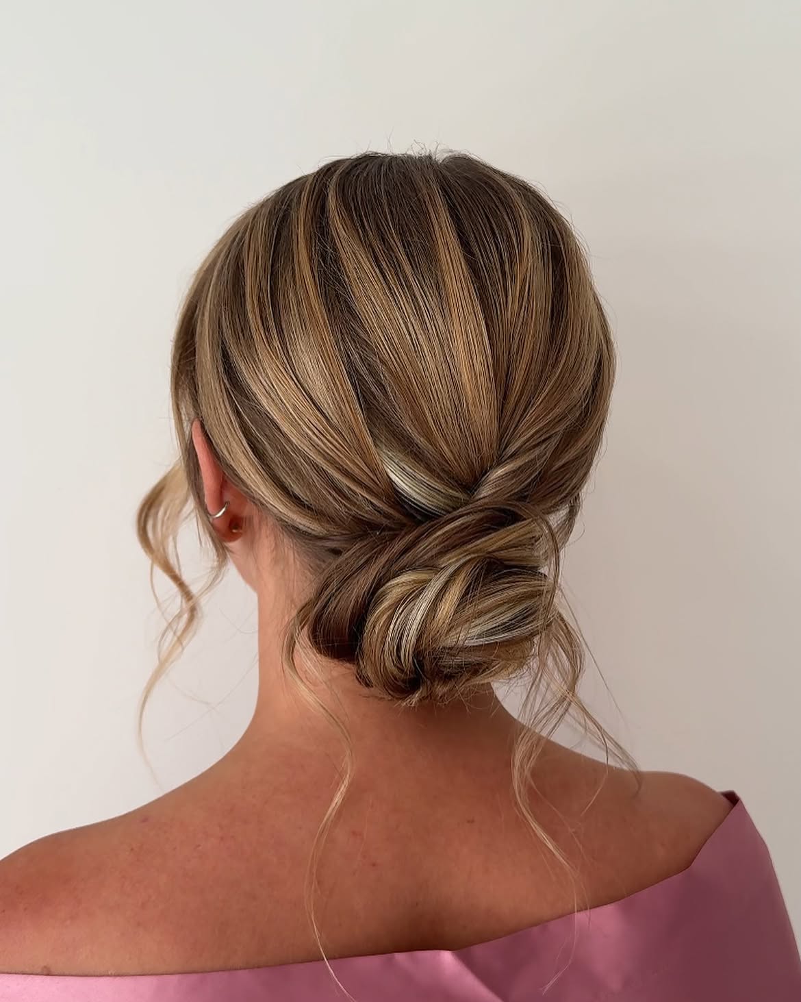 Elegant Twisted Chignon With Face-Framing Strands
