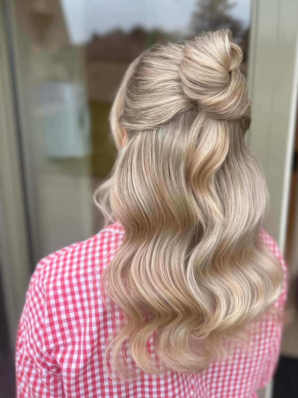 Elegant Twisted Half-Up with Voluminous Waves
