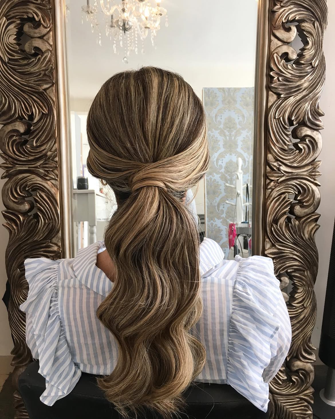 Elegant Twisted Low Ponytail With Caramel Highlights