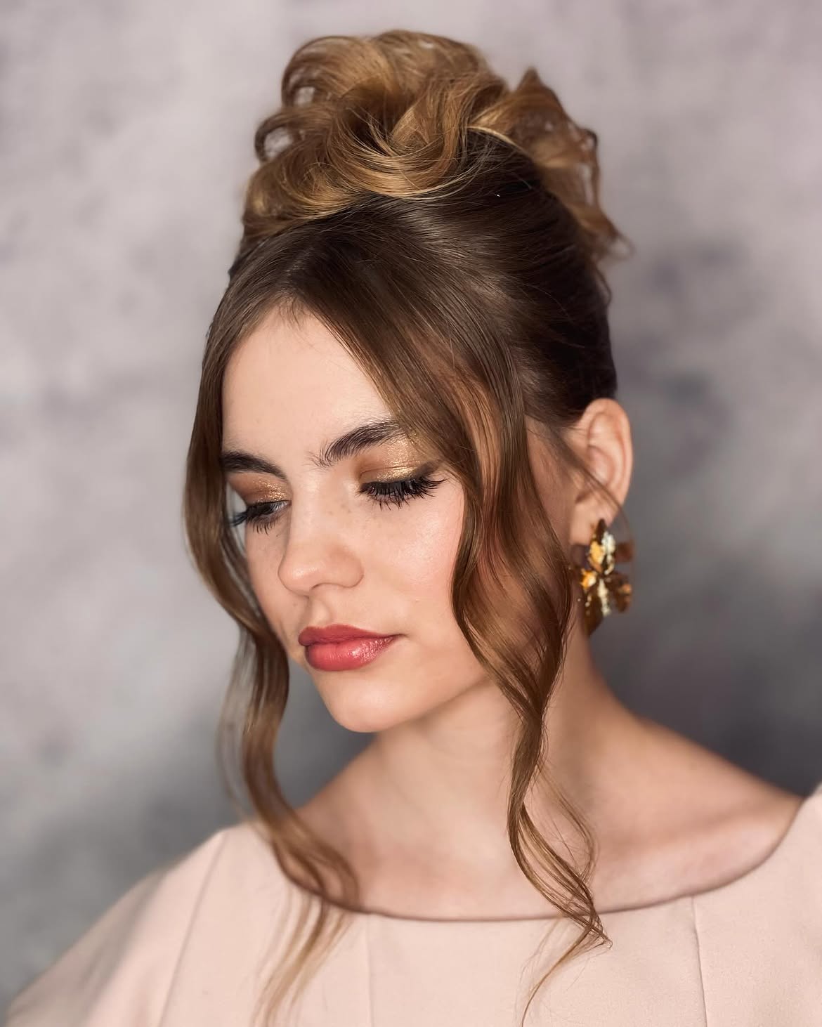 Elegant Updo With Cascading Loose Waves