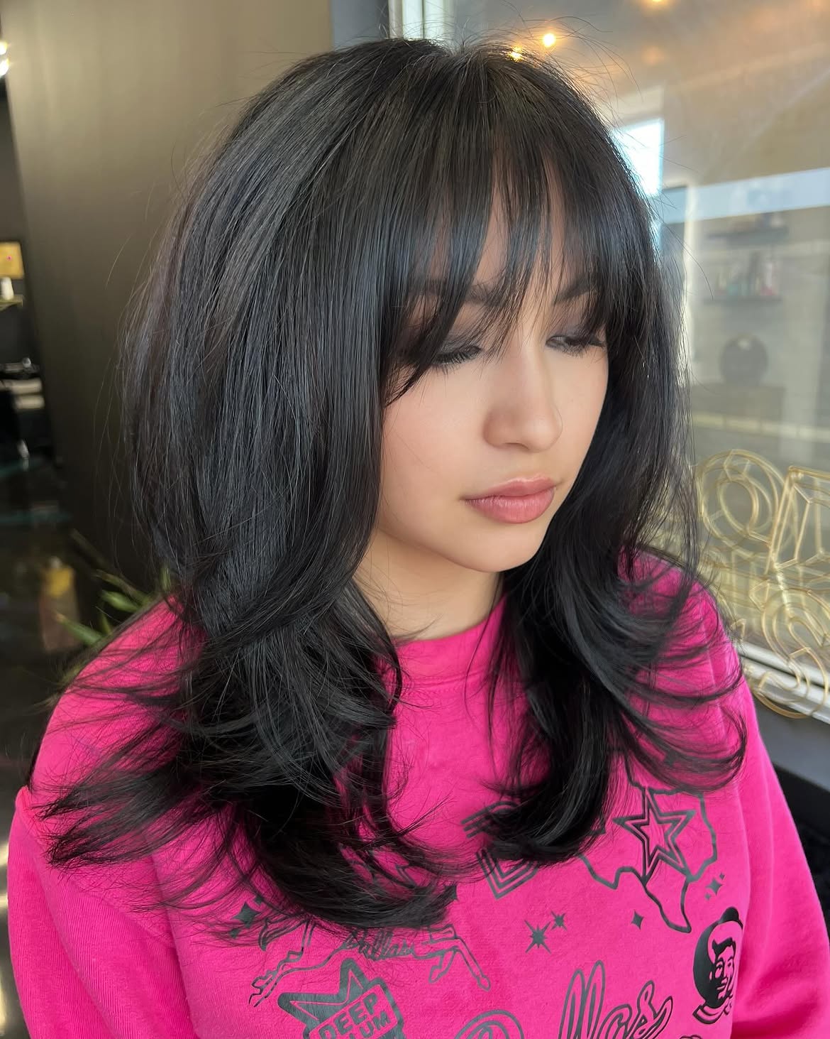 Face-Framing Layers With Subtle Wispy Bangs