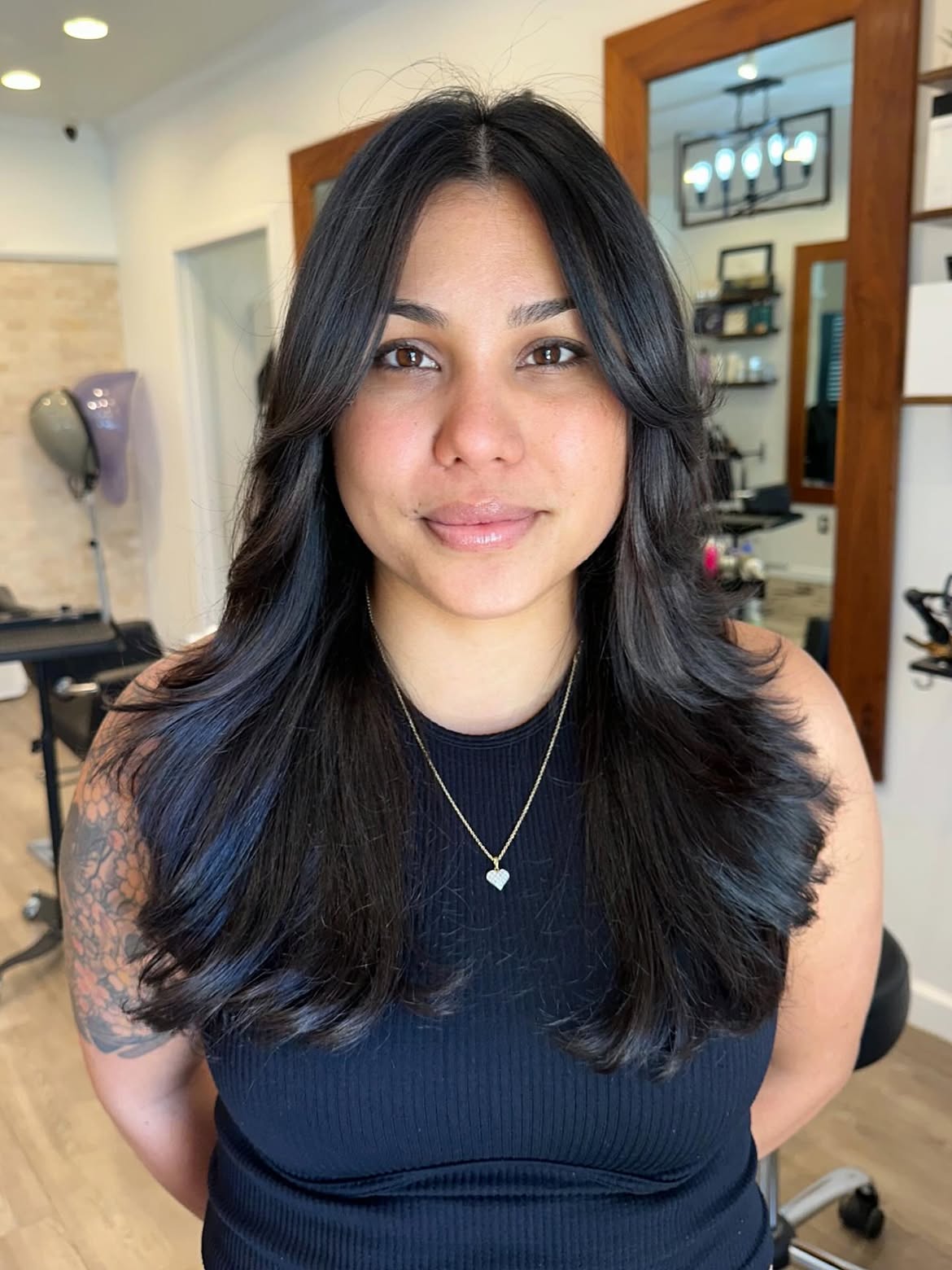 Feathered Layers With Face Framing Bangs