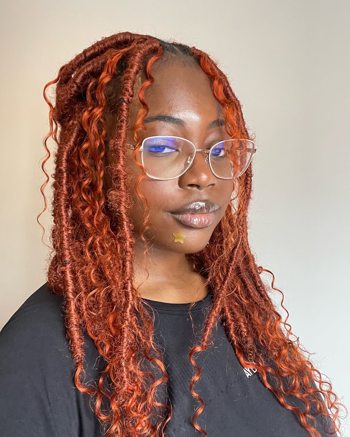 Fiery Copper Butterfly Locs With Loose Curls