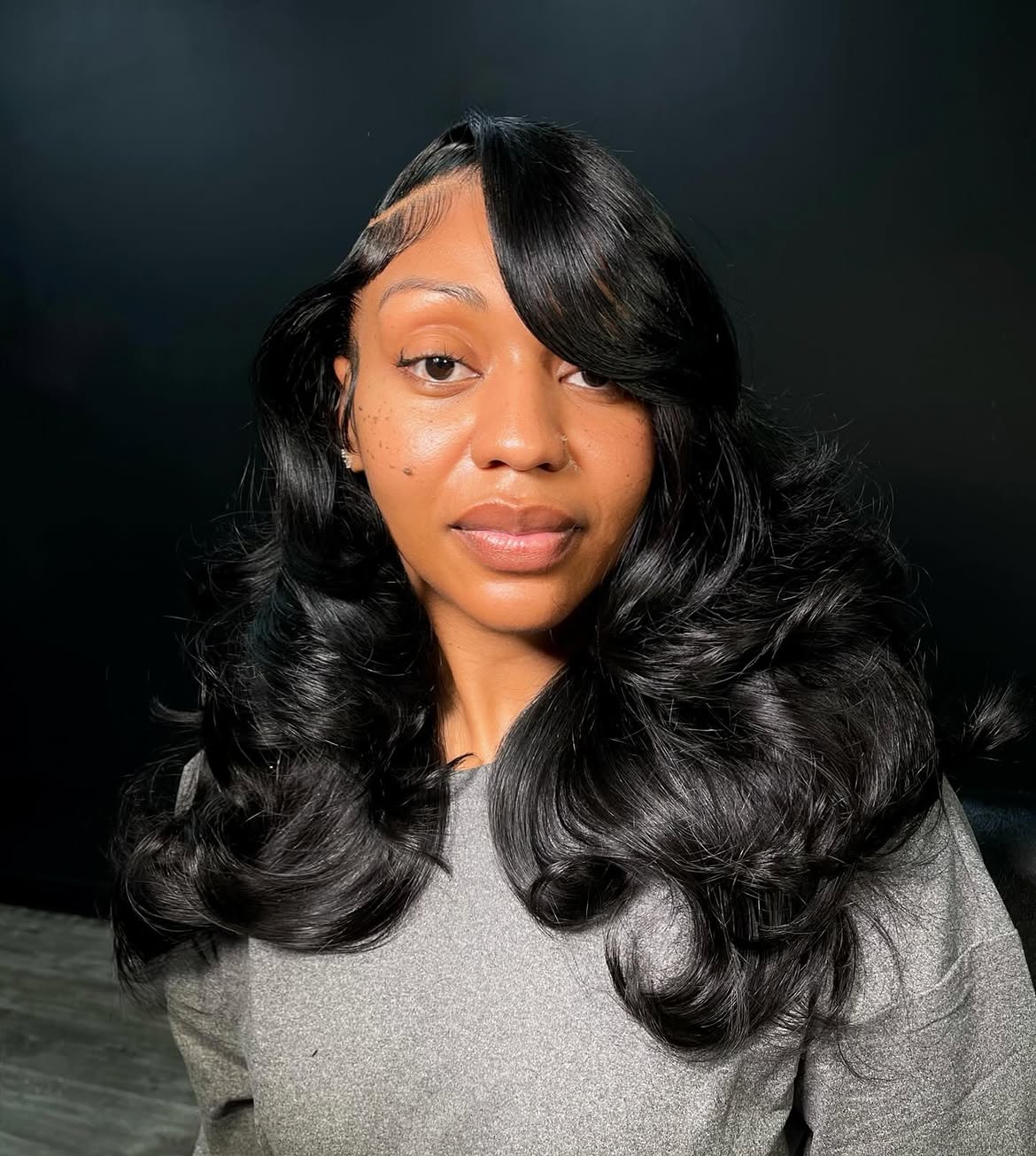 Glamorous Deep Side Part With Voluminous Curls