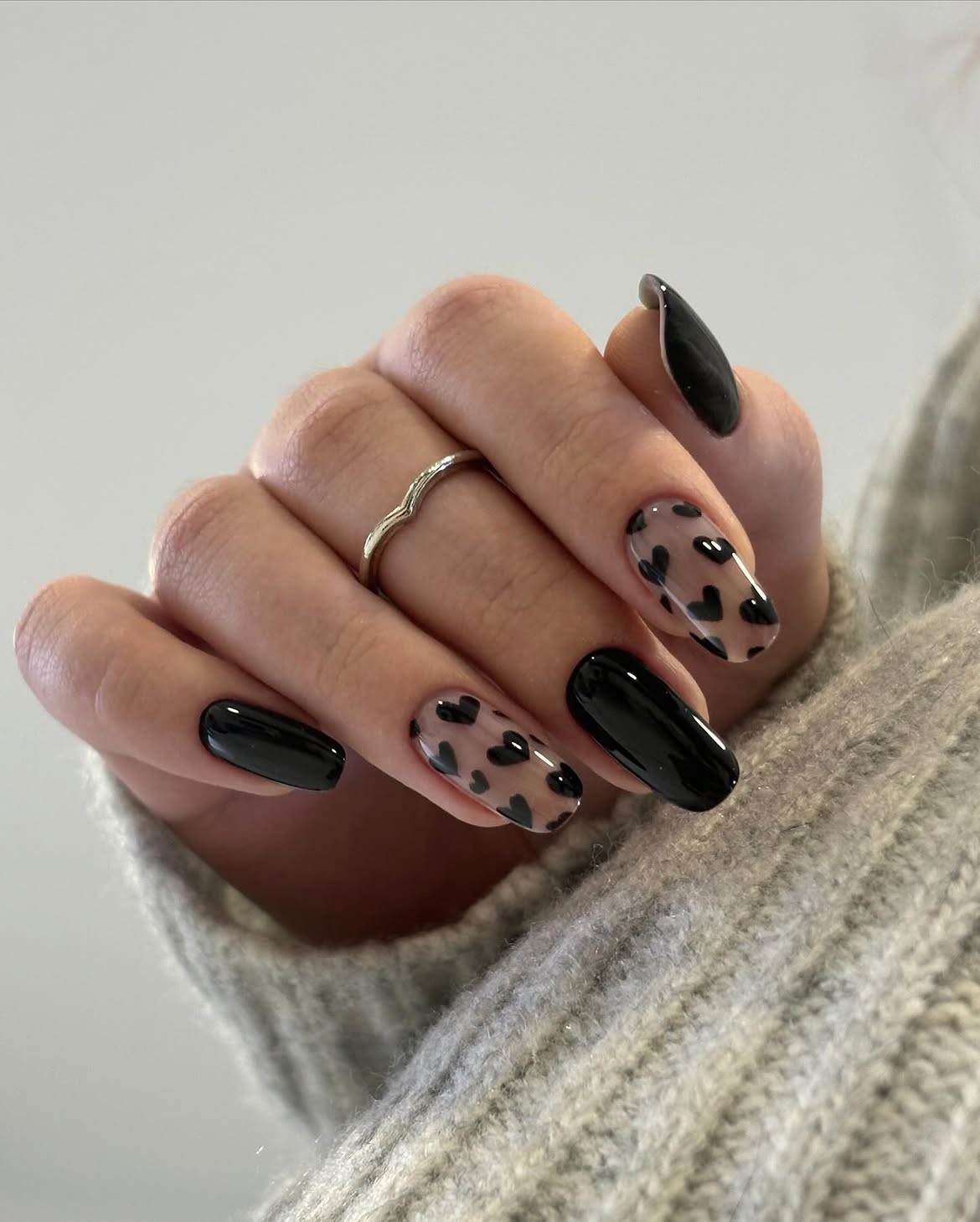Glossy Black Heart French Almond Nails