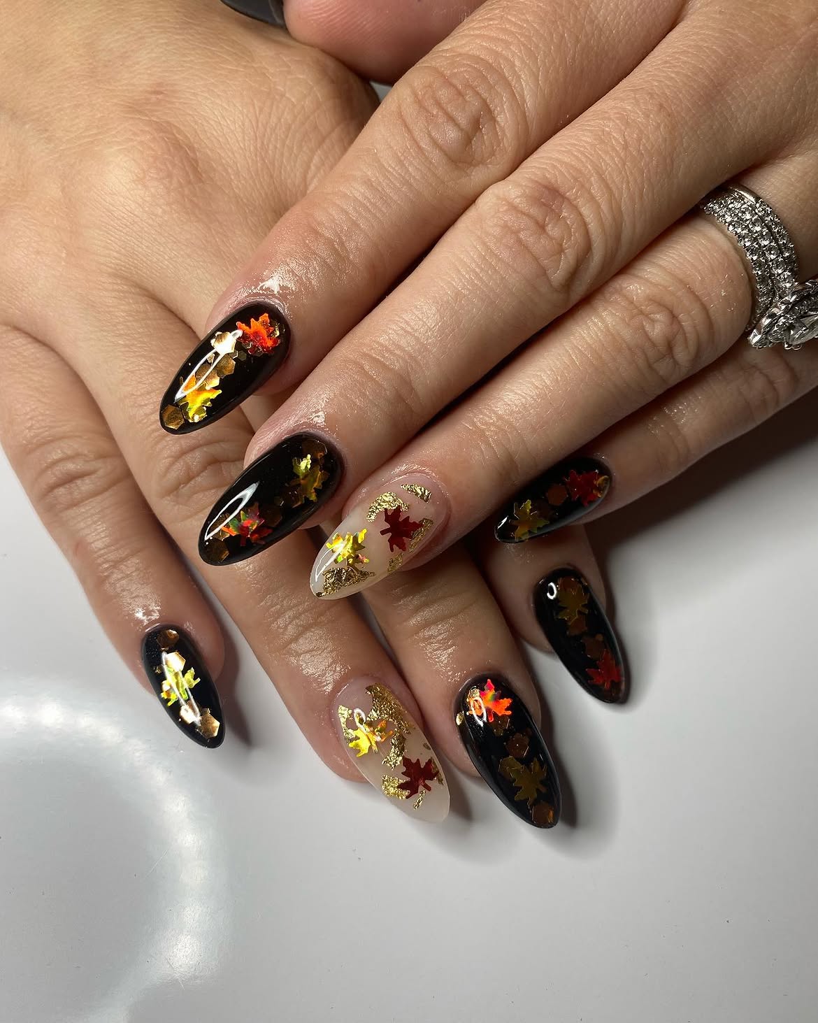 Glossy Black & Nude Fall Leaf Accent Nails