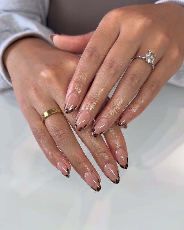 Glossy Cheetah French Tip Almond Nails