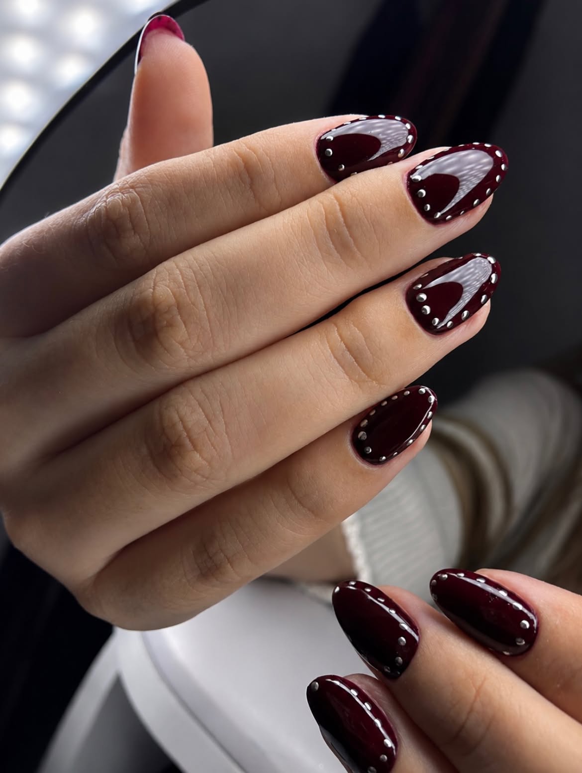 Glossy Deep Burgundy Studded Almond Nails