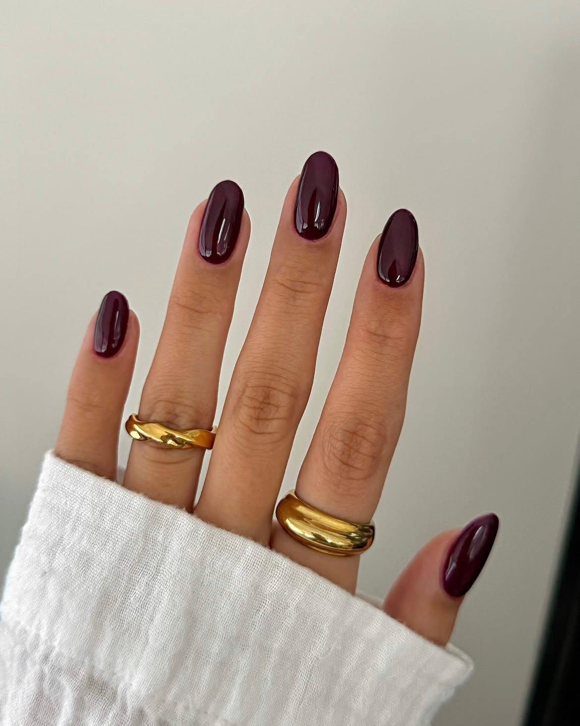Glossy Deep Plum Oval Nails