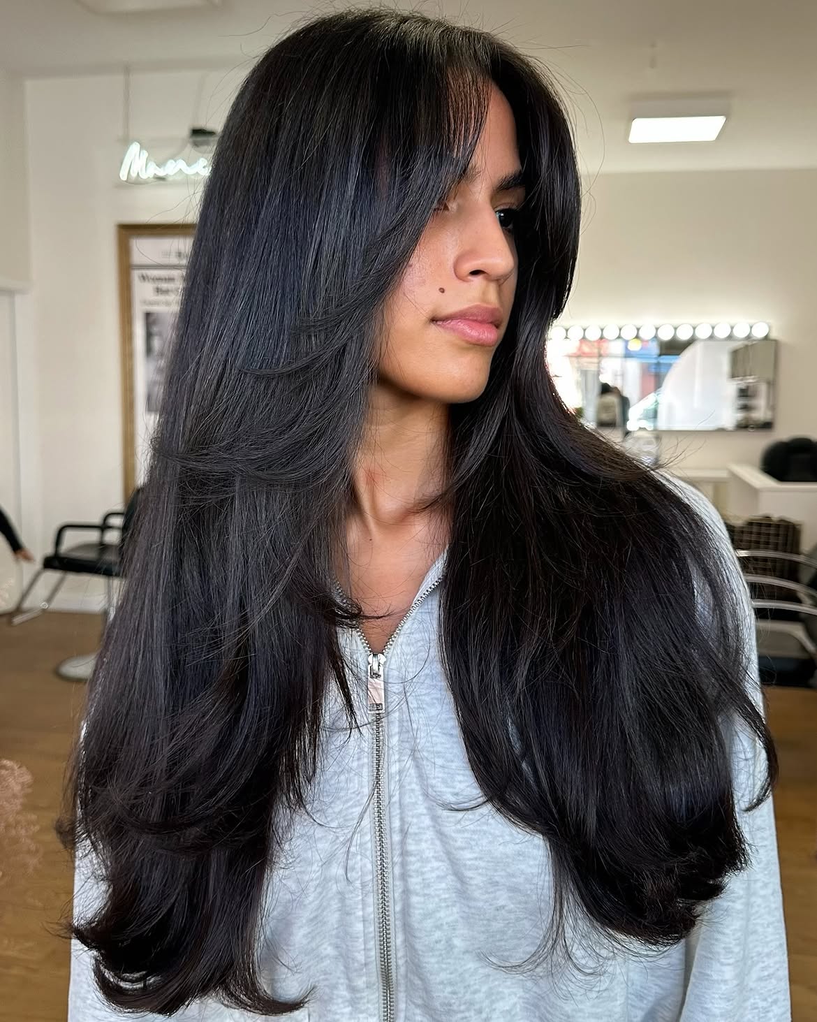 Glossy Layered Cut With Face Framing Curtain Bangs