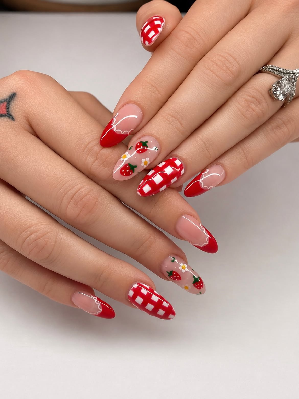 Glossy Red Gingham And Strawberry Almond Nails