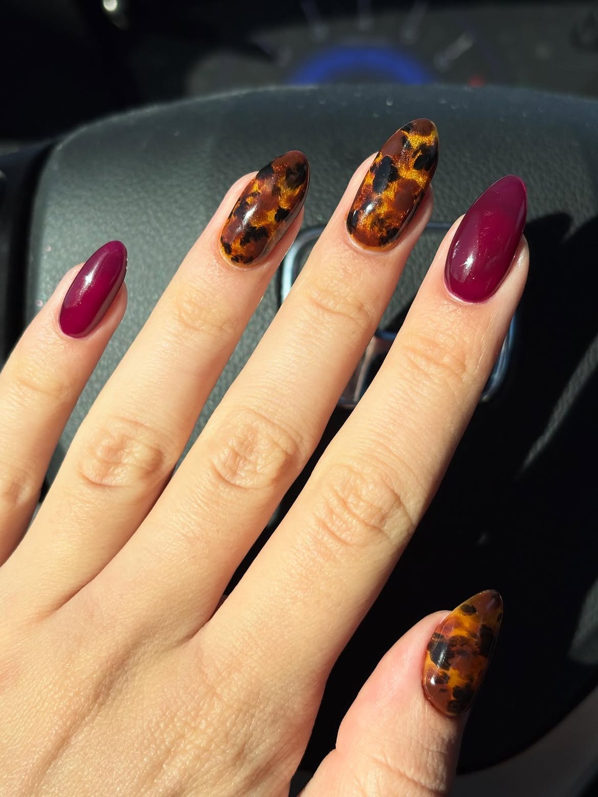Glossy Tortoiseshell and Burgundy Almond Nails