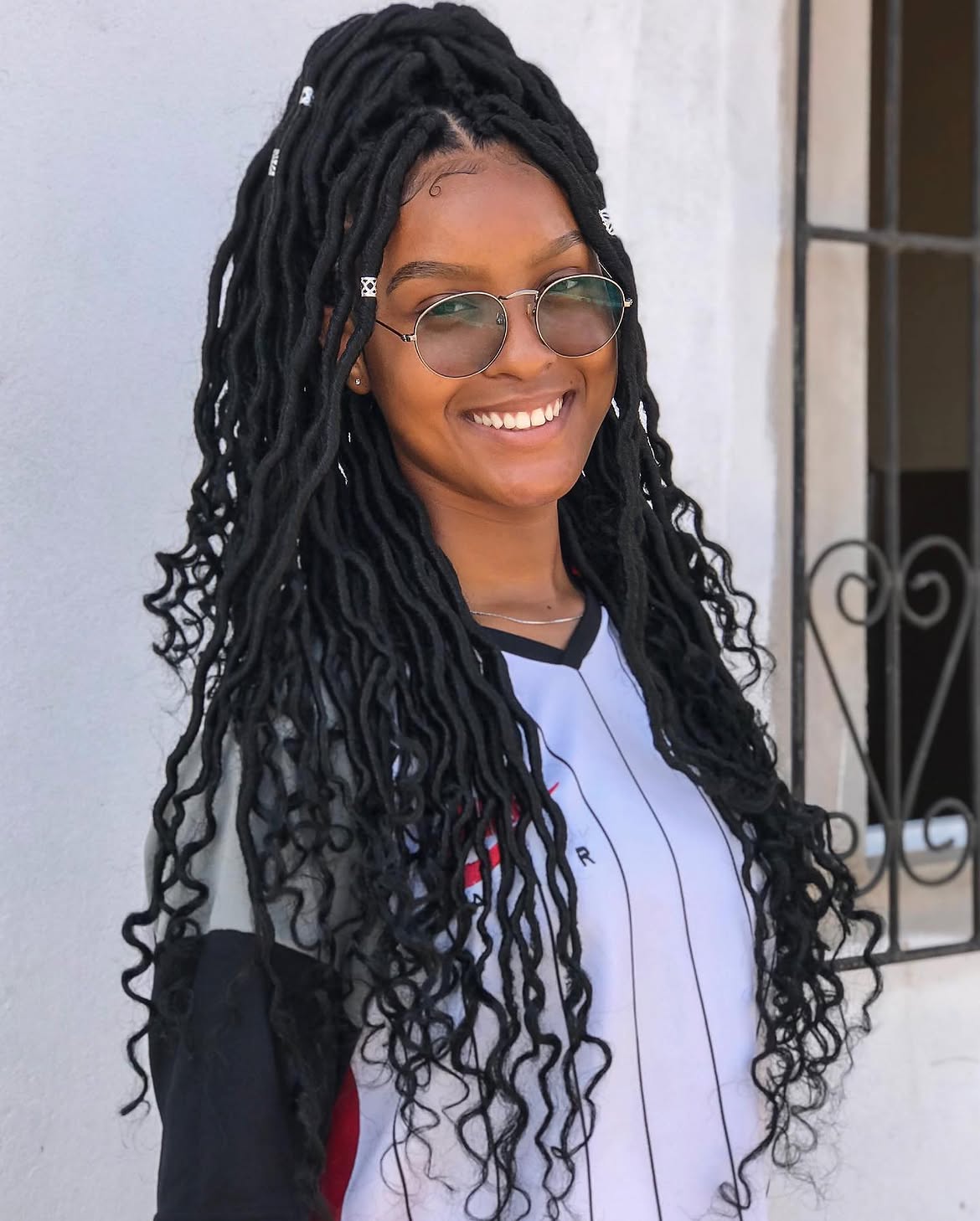Goddess Locs With Curly Ends And Silver Embellishments