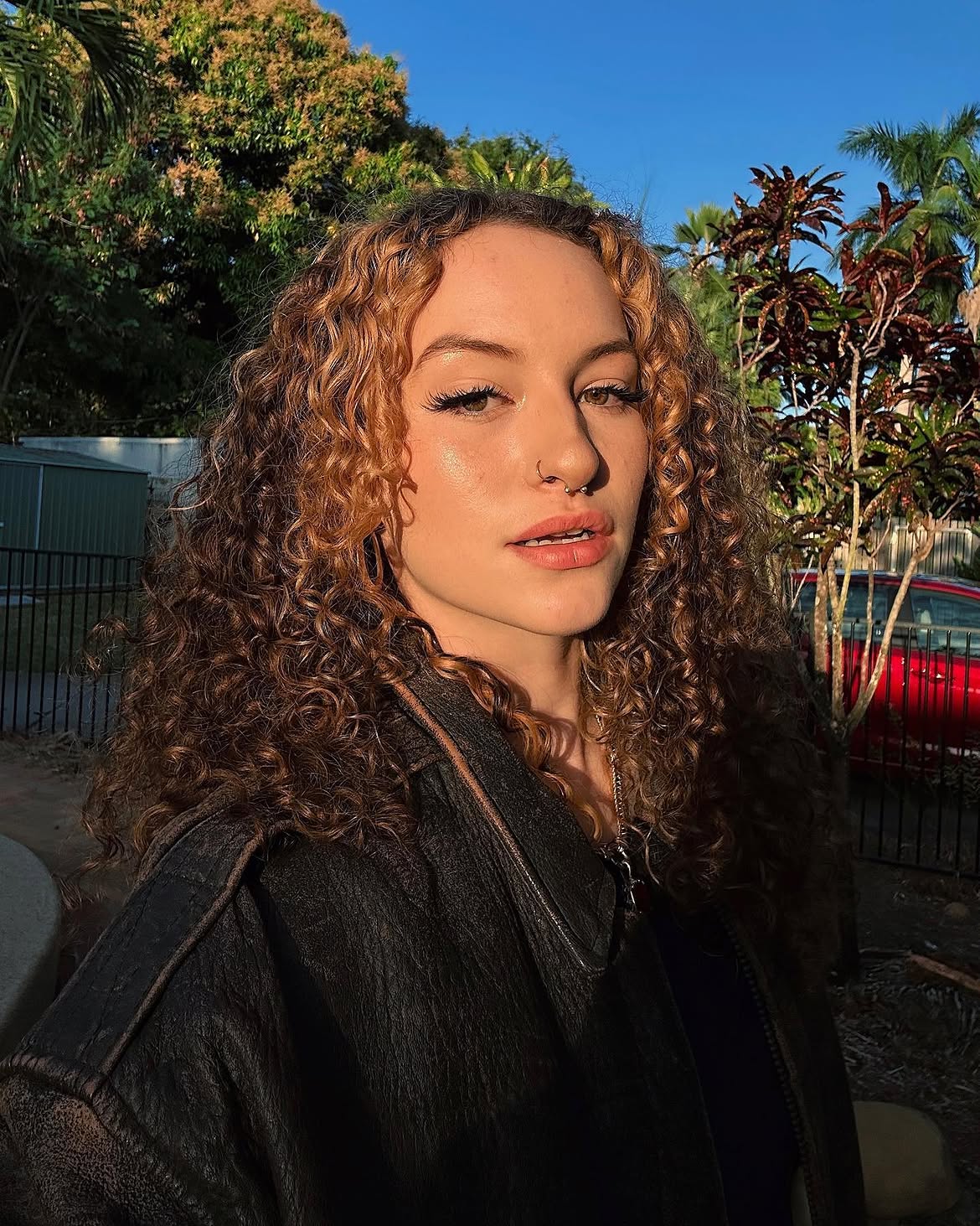 Golden Hour Beachy Curls With Honey Blonde Highlights