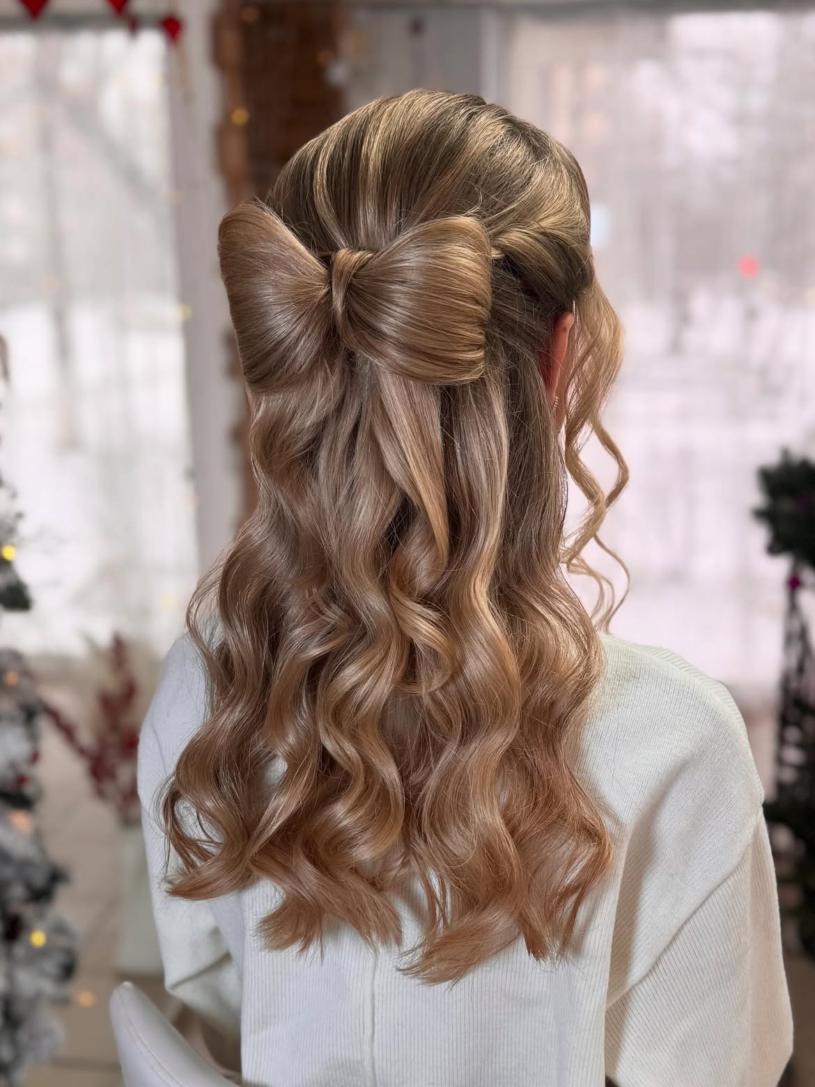 Half-Up Braided Bow With Loose Waves