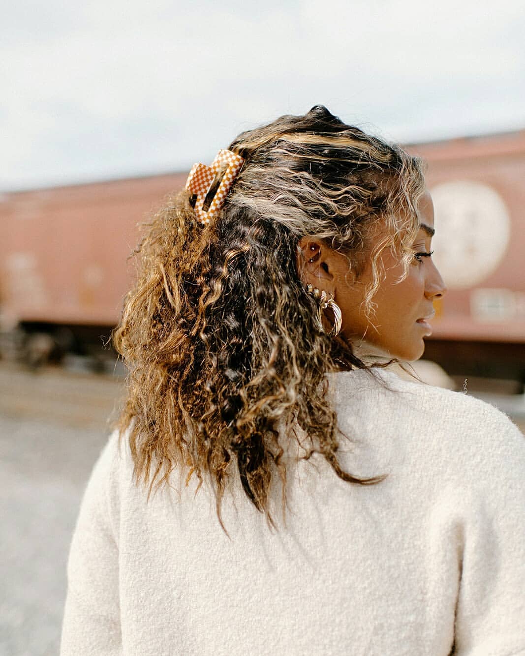 Half-Up Curls With Checkerboard Claw Clip