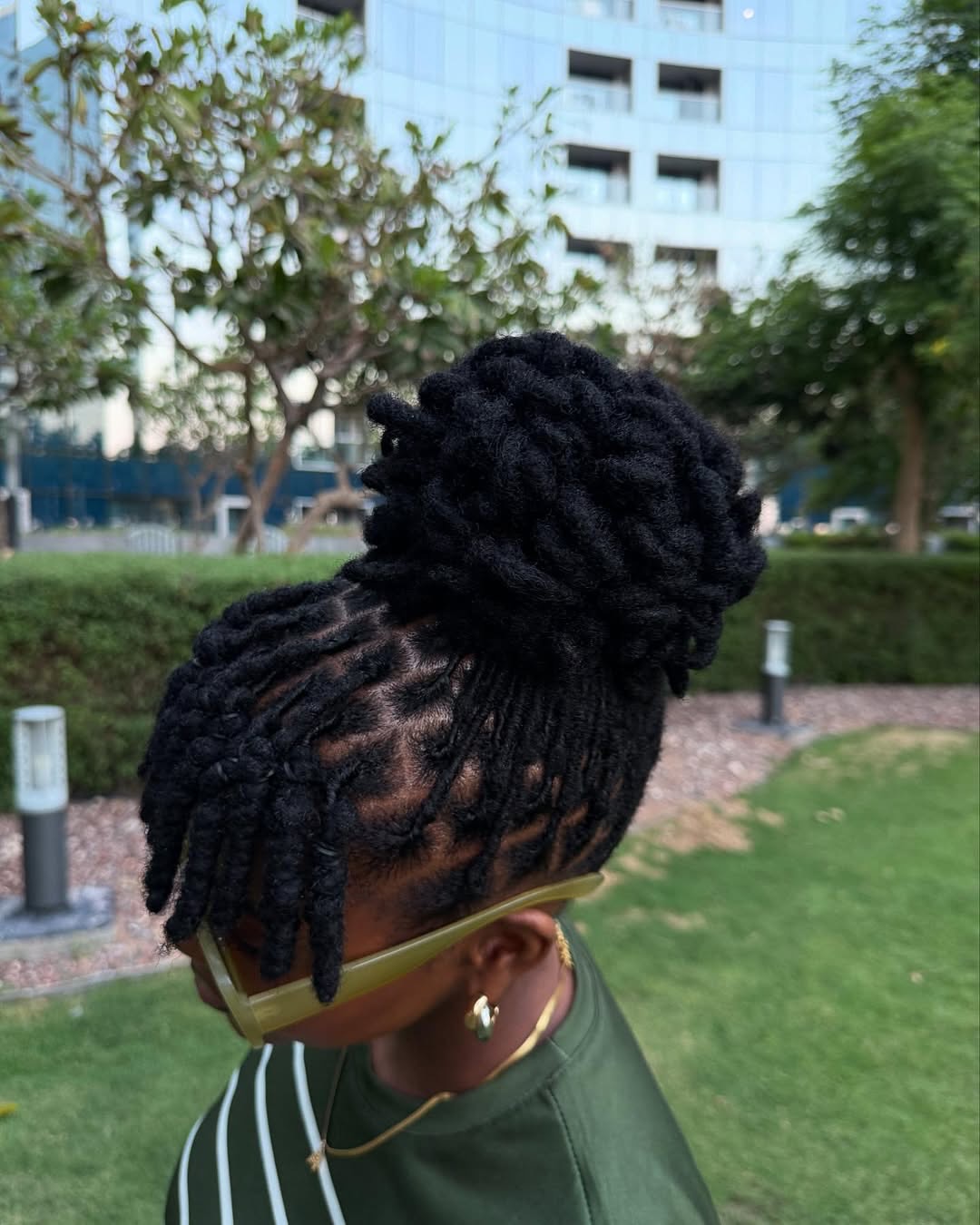 High Bun Updo With Bangs Starter Locs
