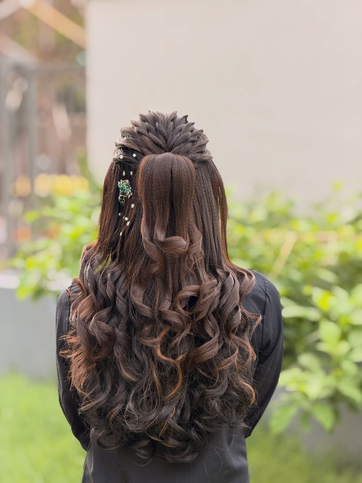 Intricate Braided Updo With Loose Curls