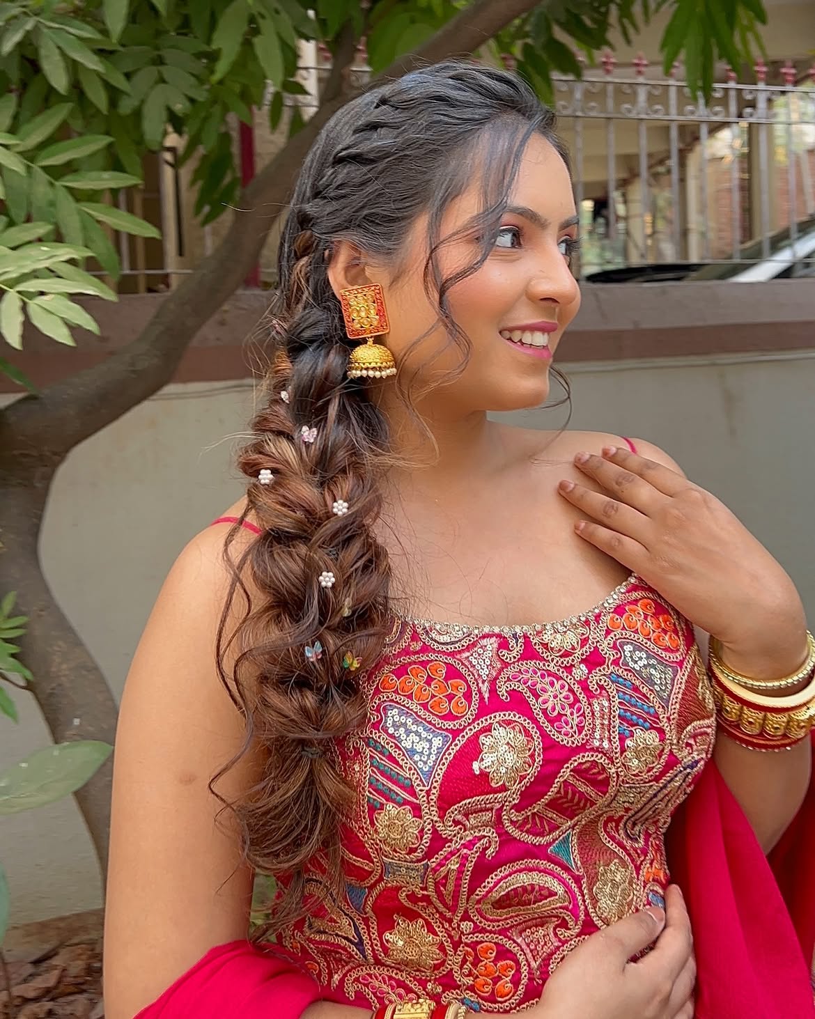Intricate Dutch Braid With Loose Curls