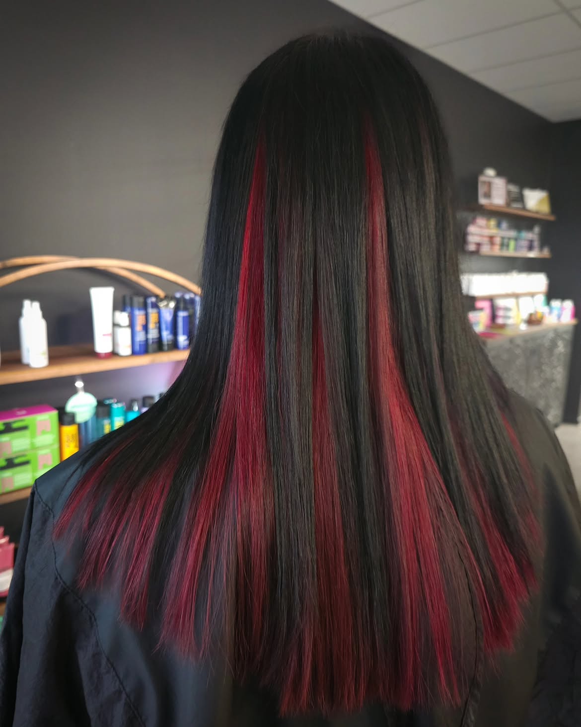 Jet Black Hair With Vivid Red Peekaboo Highlights