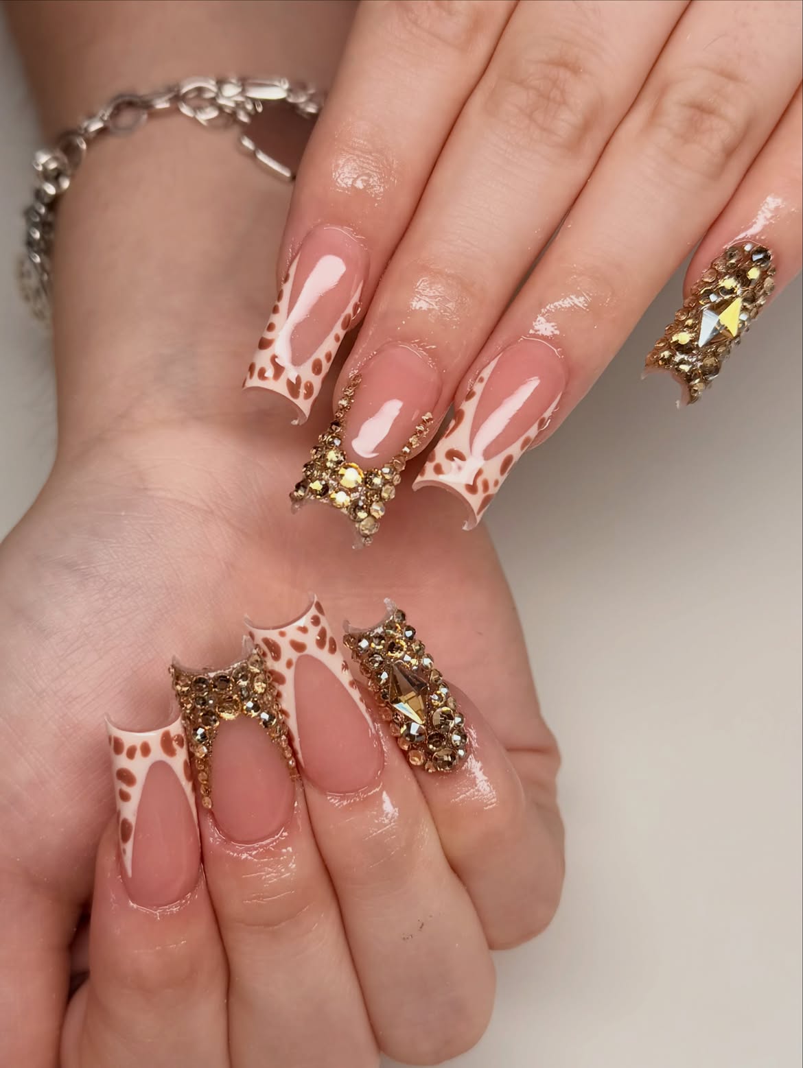 Leopard Print French Tip Rhinestone Nails