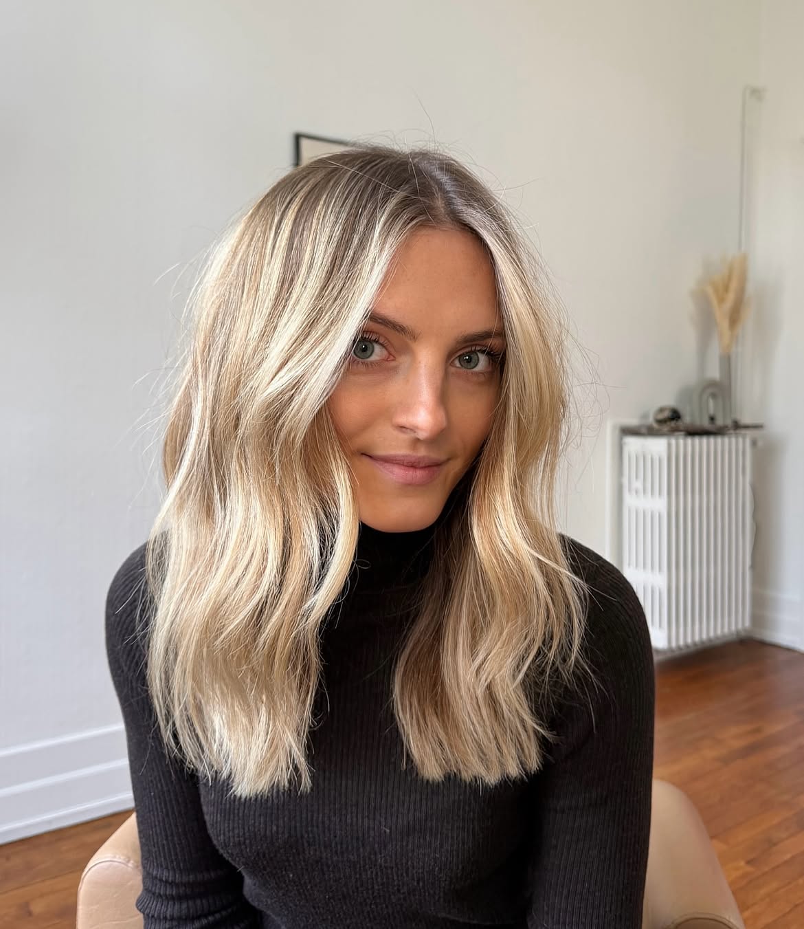 Lived In Blonde Layers With Face Framing Curtain Bangs